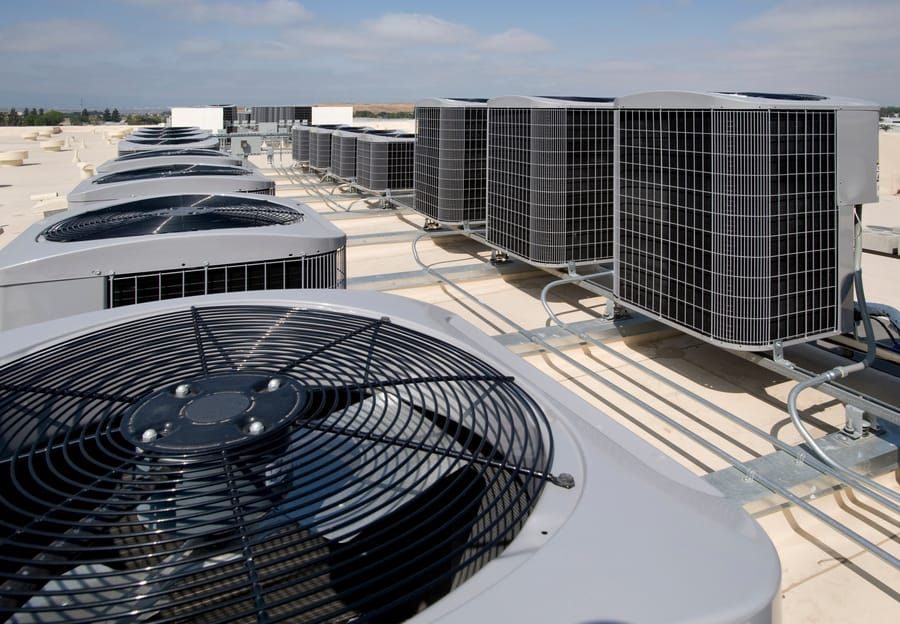 Commercial HVAC systems on a commercial rooftop.