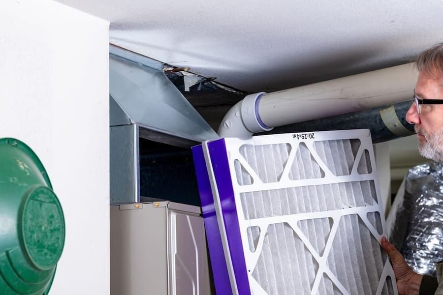 Electronic air cleaner installation in Madison and Greater Wisconsin improving air quality.