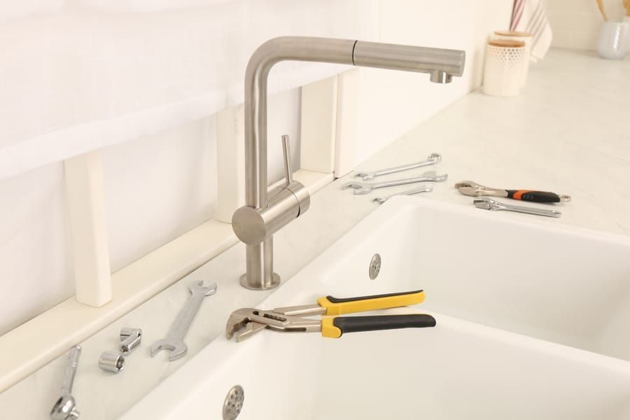 Kitchen sink plumbing work to upgrade home.