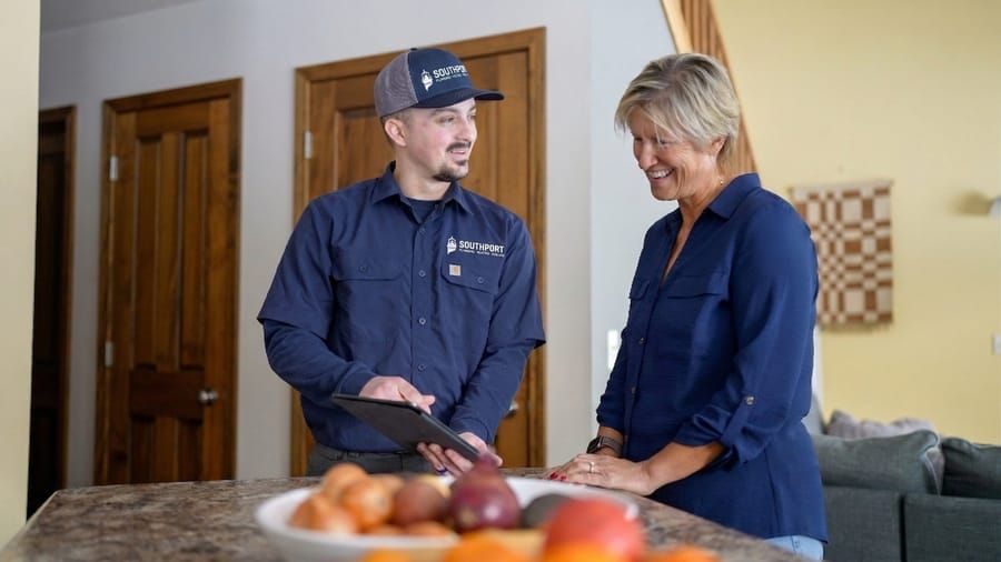 Southport Pro explaining the inspection and suggestions to client.