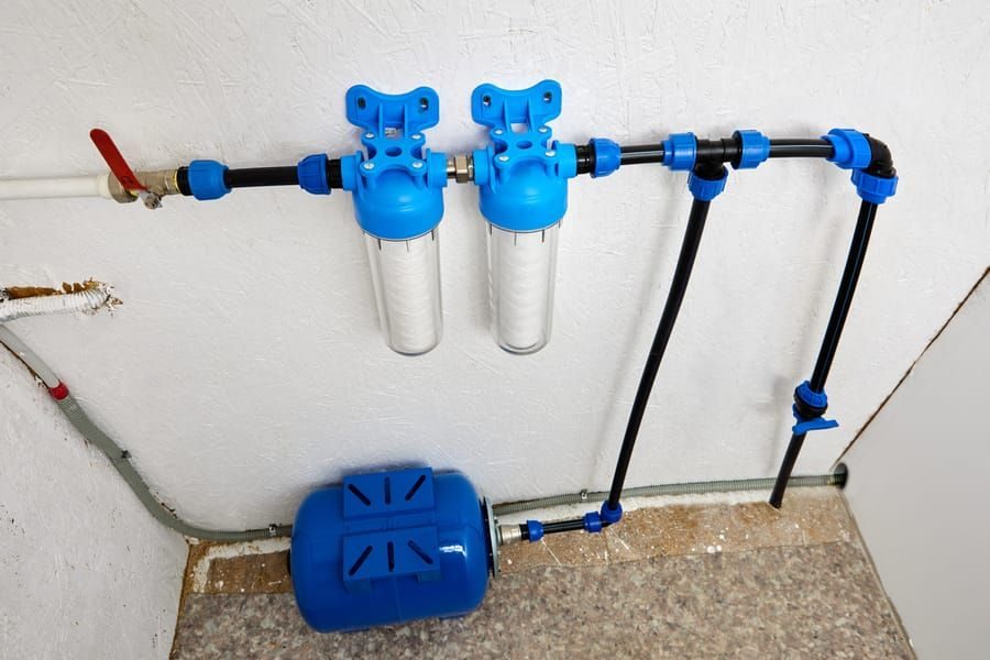 Old water softener in a residential home.